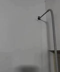 PVC Coated Flexible Metal Conduit For Indoor Outdoor Wiring Jobs Built Like A Tank To Shield Your Cables with gray wall installation.