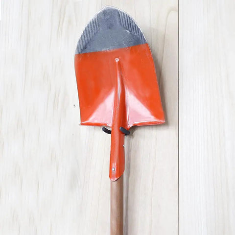 Wooden-handled shovel hanging on wall using 16 Pack U Hooks Value Pack Heavy Duty Wall Hangers For Tools Mops And Brooms.