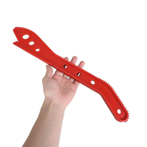 Hand holding red push stick, part of Two Pack Table Saw Push Sticks For Safer Carpentry, Anti Kickback Push Blocks, Woodworking Shop Tool