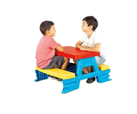 Two kids sitting at a colorful Big Plastic Picnic Table For Four Kids For Indoor And Outdoor Use Colorful Four Seat Table With 44 Pound Capacity Approximately 43 Inches Tall By 77 Inches Wide By 71 Inches Deep Kid Friendly Toddlers Ages Two And Up