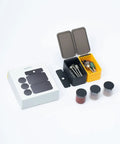 Badass Sixty Piece Rotary Tool Accessory Crate with various attachments in black and yellow storage boxes for DIY projects.