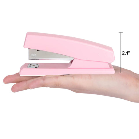 Pink Office Desktop Stapler With 25 Sheet Capacity And Holds Up To 120 Staples shown on a hand for size reference, 2.1 inches tall.