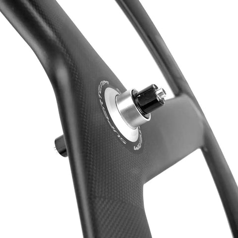 Close-up of Full Carbon Tri Spoke 700C Clincher Wheelset for Fixie Rigs showcasing carbon material and hub detail for speed.