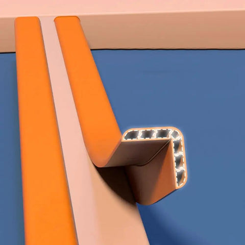 Close-up of Rubber Wall Corner Guards 16.4ft Self Adhesive L Molding Edge Protectors showcasing its cuttable design on a blue surface.