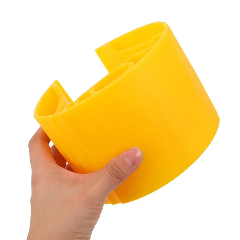 Built Different Yellow Column Protector Wrap For Warehouse Vertical Beam Support And Anti Collision Post Cover With Forklift Impact Shield For Grocery Store Safety Boss Level, held in hand.