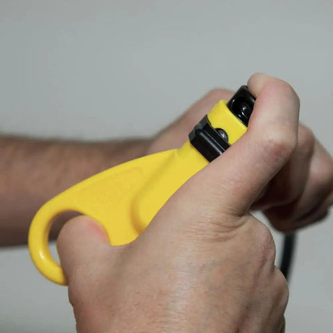 Close-up of yellow coax cable stripper from Coax Install And Test Kit With Crimp Tool, Tester, Stripper And Universal F Connectors