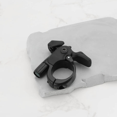Black aluminum alloy remote lockout lever on stone surface for 22mm handlebars, compatible with SR Suntour Axon Epicon Raidon XCR NCX forks.