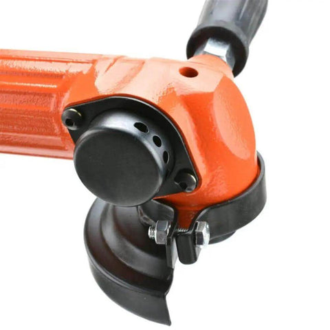 Close-up of Heavy Workhorse 4 Inch Pneumatic Angle Grinder Pumping Out Serious High Torque Air Power Tool with black switch and cutting disc.