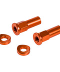 Angled view of two orange anodized rim-lock bolts with washers for KTM motorcycles.