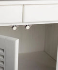 Four Pack Cabinet Door Magnetic Catches with Strong Magnets for Secure Quiet Closures installed on a white cabinet