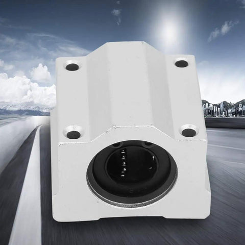 Built To Last Aluminum Slide Block With Smooth Ball Bearing Bushing for reliable linear motion, close-up view against a blurred background.