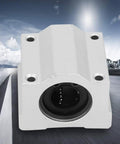 Pro Grade Aluminum Linear Motion Slide Block For CNC And 3D Printers Built Tough, close-up view showing sealed bearing and mounting holes.