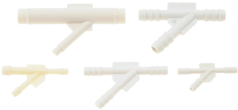 Five white plastic vacuum tubing Y-tee connectors with barbed ends, assorted sizes for automotive vacuum systems.