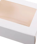 Close-up of Kraft Paper Cookie Boxes With Clear Window Safe And Odorless Bulk Pack Of 50 Mini Treat Boxes for display.
