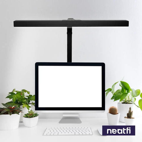 Beefy 3000 Lumen LED Desk Lamp With Clamp For Home Office Dimmable over computer, surrounded by plants, showing sleek design.