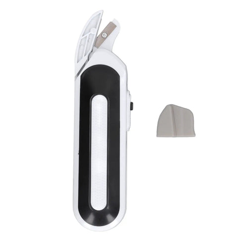 Ultra Slick Cordless Electric Scissors For Fabric Cutting And Crafting Projects Deliver Lightweight Portable Build With Razor Sharp Metal Blades Plus Dual Power Options For Hassle Free Sewing On The Go, side view with blade exposed.