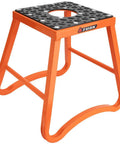 Aluminum MX Mini Stand Maintenance And Support For Dirt Bikes, Lightweight Yet Sturdy Workhorse, 14.5 Inch Tall, 10x10 Inch Heavy Duty Top, Wide Base For Maximum Stability, Oil And Gas Resistant Rubber Deck, Orange Finish shown from front angle