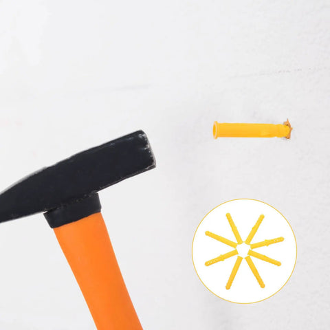 Heavy Duty Yellow Self Drilling Wall Expansion Anchor Kit, 200 Pack being installed in wall with hammer