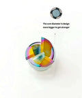 Top view of end mill shavings in a round container, iridescent multicolor metal pieces.