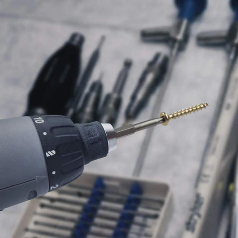 Close-up of a drill with a bit from Beefy 12 Piece Torx Bit Set with One Quarter Inch Hex Shank T5 to T40 S2 Steel