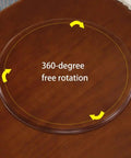 Heavy Duty Wooden Lazy Susan Turntable 33 Inch Round Serving Tray showing 360-degree free rotation on a brown wooden surface.