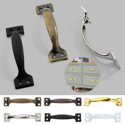Assorted vintage door pulls in various finishes including red bronze for 3/4-5/6 inch doors, rustic barn-style hardware display.