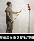 Man using Compact Collapsible Tower Work Light With Foot Pedal Switch Hella Bright 12v And 20v compatible battery for painting.