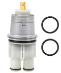 Front view: Delta RP46074 shower valve cartridge with brass stem and gray plastic body; includes two black O-rings.