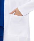 Close-up of a women's white lab coat pocket, part of Womens Lab Coat With Three Pockets Medical Lab Coat For Science Chemistry And College White Medium All Day Comfort Breathable 65 Polyester 35 Cotton Twill Quick Dry Low Wrinkle Easy Care Professional Fit.
