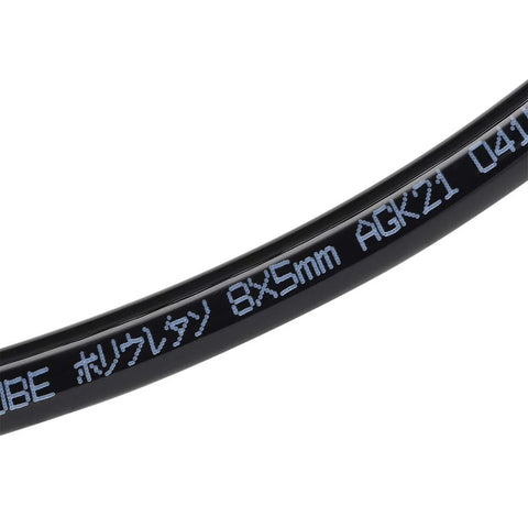 Close-up view of black PU pneumatic air tubing, 8mm OD x 5mm ID.