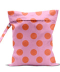 Coral Pink Polka Dot Wet Bag And Dry Bag For Beach And Pool Waterproof, Machine Washable And Reusable with handy handle visible
