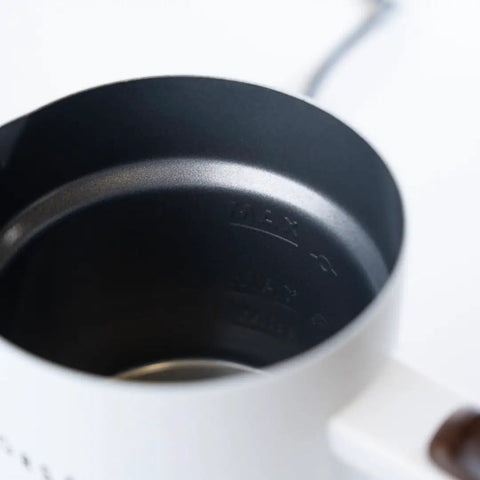 Interior view of Electric Milk Frother 4 In 1 for Hot and Cold Foam One Touch Automatic Milk Steamer and Warmer Machine