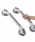 Two Pack Suction Grab Bars For Shower And Bath Removable Heavy Duty Waterproof, with hand demonstrating use