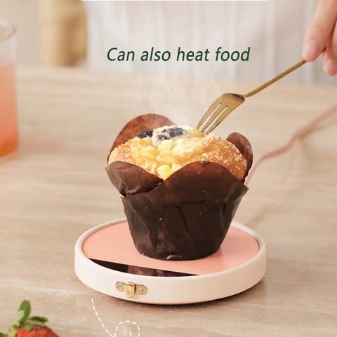 Smart Electric Coffee Mug Warmer Triple Temperature Settings Digital Display keeps muffin warm on pink compact base.