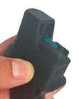 Close-up of TM22 22LR Magazine Speed Loader with built-in bullet extractor and ergonomic design in black biopolymer.