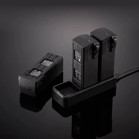 Mavic 3 100W Battery Charging Hub With Triple Port Smart Charger for fast sequential drone battery charging on reflective surface