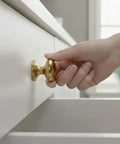 Hand turning brushed satin gold wide base bifold closet door knob on drawer, 4 pack with golden round cabinet wardrobe pull knobs.