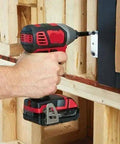 Heavy Duty 18 Volt Cordless Rig Showcasing A Boss Level Half Inch Drill in use fastening drywall to framing.