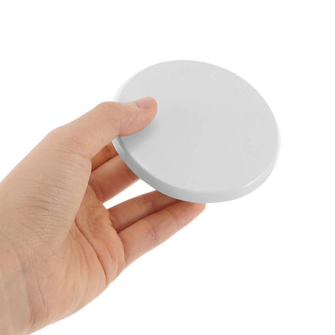 2 Pack Fire Sprinkler Cover Plates Flush Ceiling Finish No Fuss Snap Install Winter Guard white plate held in hand.