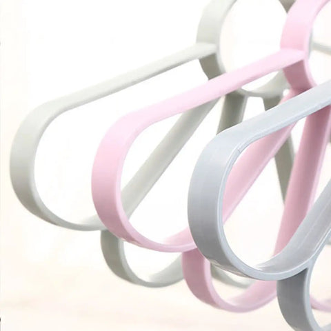 Fan Shaped Closet Rod Organizer For Ties Scarves And Hats Made From Sturdy Polypropylene in soft pink and gray colors.
