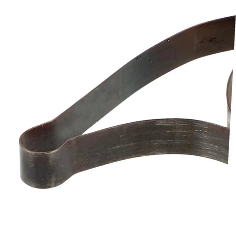 Close-up of metal spring from 4 Piece Mechanical Clock Main Spring Repair Kit For Wind Up Alarm Clocks Replacement Parts And DIY Timepiece Restoration