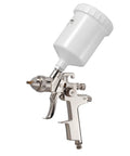 Heavy Duty Lvlp Air Spray Gun Featuring Gravity Feed Cup And Quick Swap Nozzles For A Hella Smooth Automotive And Wood Finish Includes Built In Pressure Regulator For No Fuss Shop Work, showing gravity feed cup and nozzle.