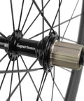 Close-up of superteam hub on 50mm Carbon Clincher Wheelset For 700c Road Bikes With Silver Decal Dope Aero Performance UCI Approved EN Tested