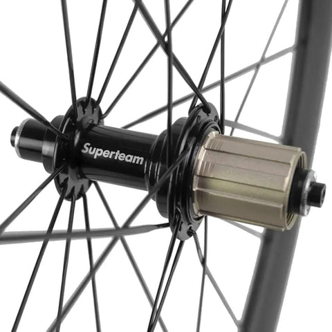 Close-up of superteam hub on 50mm Carbon Clincher Wheelset For 700c Road Bikes With Silver Decal Dope Aero Performance UCI Approved EN Tested