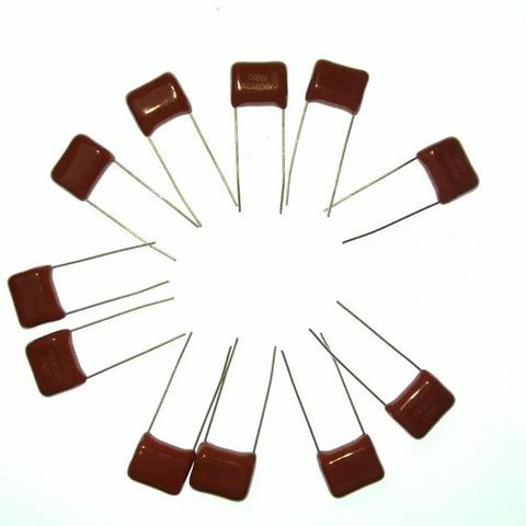 Circular arrangement of Metallized Film Capacitor Kit 180Pcs with 15 values CBB22 Polypropylene DC capacitors, radial leads visible