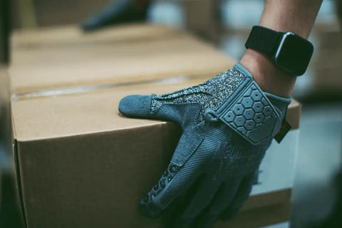 Box Cutter Gloves With Cut Resistant Grip For Construction, Woodworking And Home Improvement, machine washable, grey, large, in use.