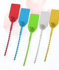 50 Self Locking Cable Ties With White Label Boards For Straight Up Cord Management No Sweat Wire Organizer Bundle Wrap Top Shelf Heavy Duty Nylon Fastener Alternative in red, blue, green, white, and yellow.