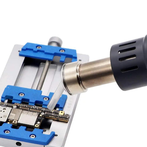 Nine Piece Hot Air Gun Nozzle Set for 861DW Rework Station in use on PCB with 45 degree angled nozzle shown directed at circuit board.