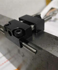 Close-up view of Badass Strength Precision Vise Stop Locators for CNC Milling Machines on a metal surface.