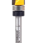 Top Shelf Flush Trim Router Bit With Heavy Duty Tungsten Carbide Edge For Knockout Smooth Cuts And Easy Template Hinge Mortising 1/2 Inch Cutting Diameter 1/4 Inch Shank view of the bit with yellow cutting edge.